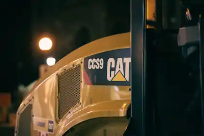 landfill compactor at night