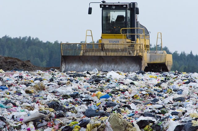 A compactor on a landfill