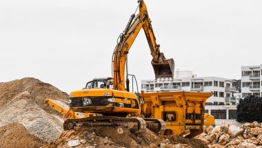 Excavator removes Waste in 2008 to illustrate our Review of the Year in UK Rubbish.
